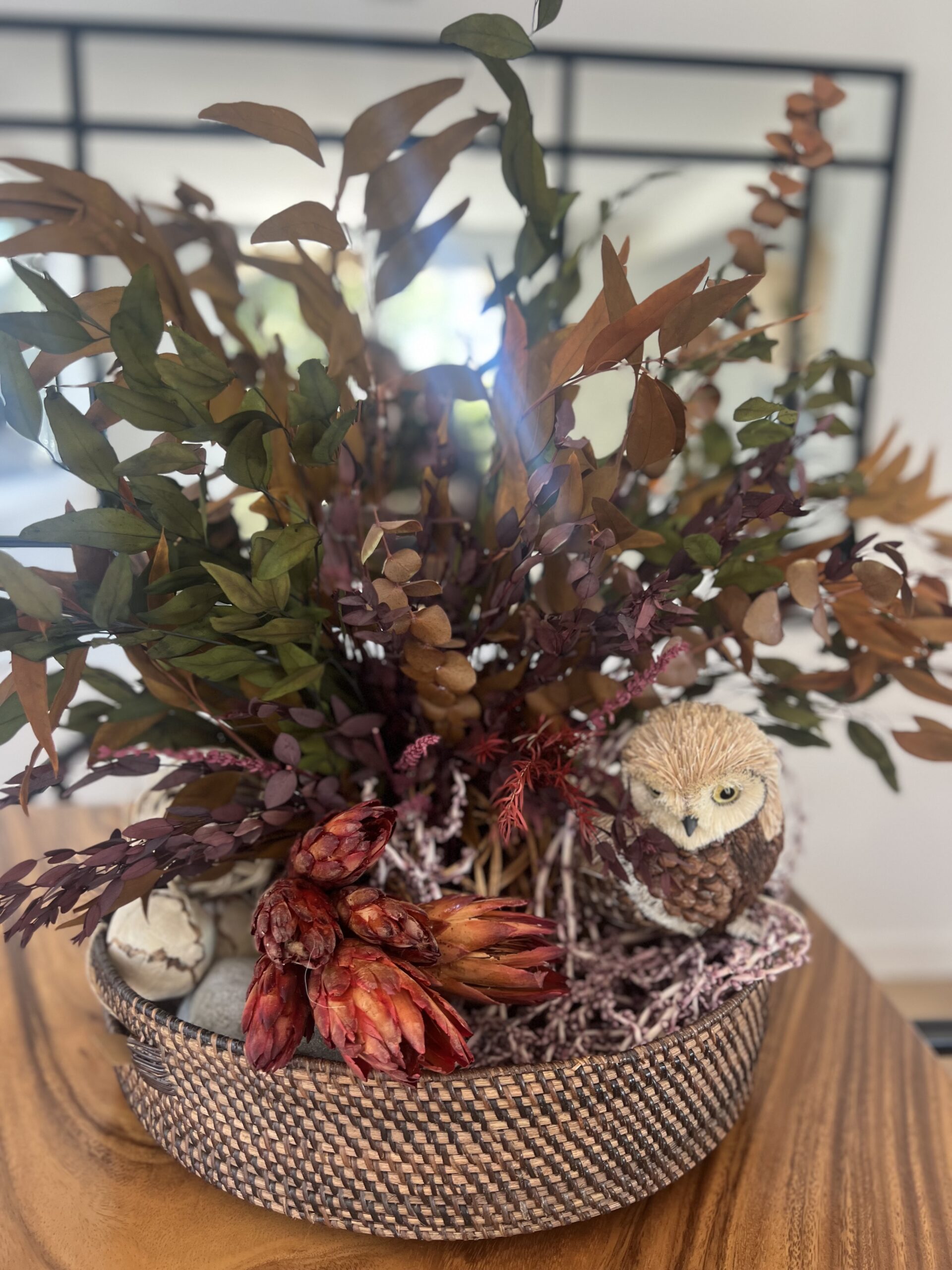 Basket with dried flower arrangement